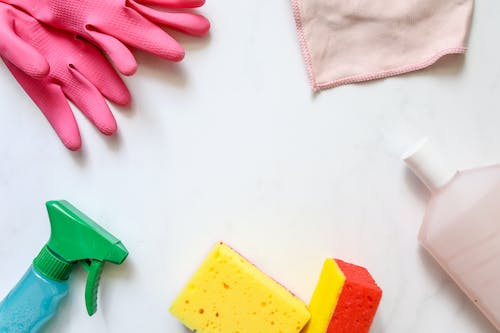 Cleaning essentials like gloves, sponges, cleaning agents